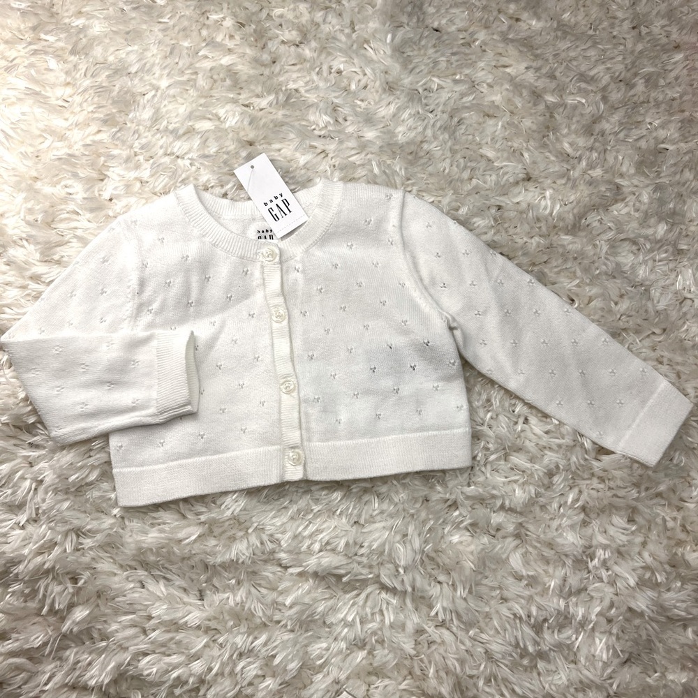 White baby GAP sweater